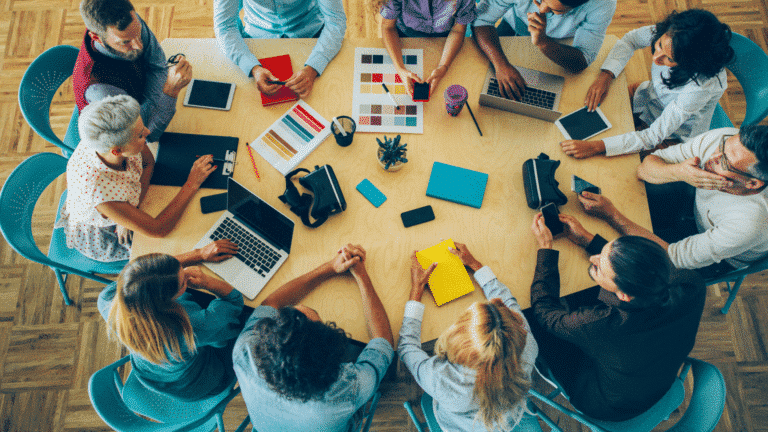 Business Meeting with a diverse group of people sitting at the table. Aerial view. Healthy Church Meeting